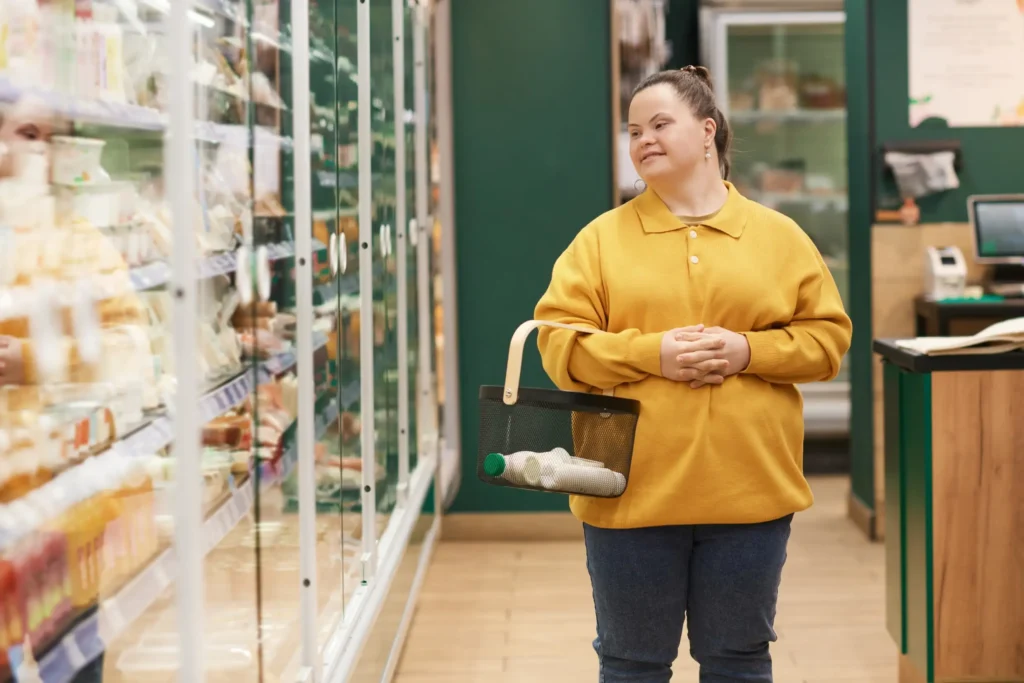 Disabled woman with down syndrome grocery shopping
